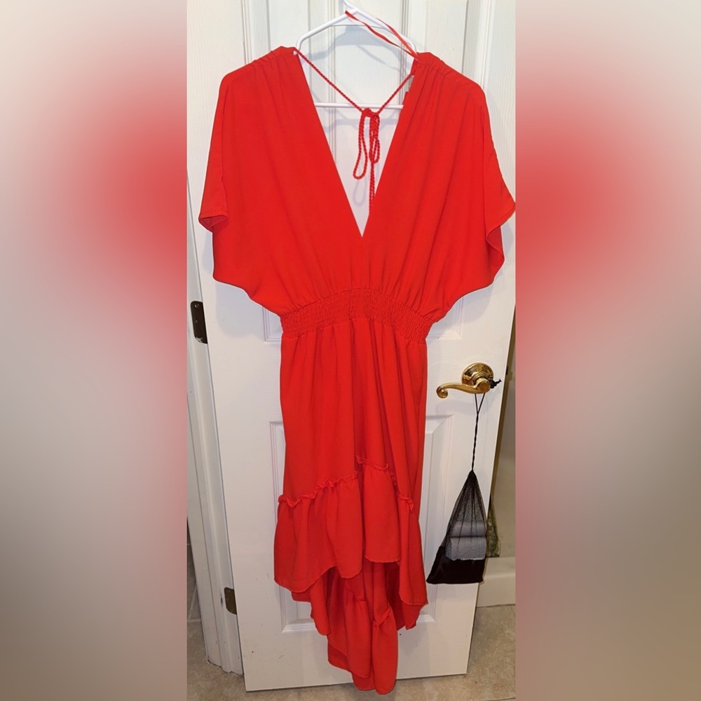 Beautiful bright red high low dress with open back